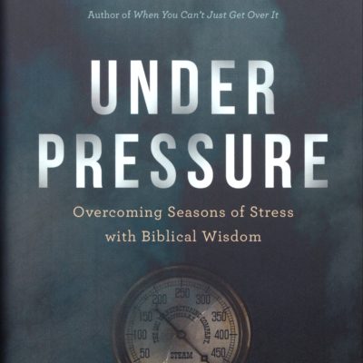 Blue book cover with a steam pressure guage with a high reading